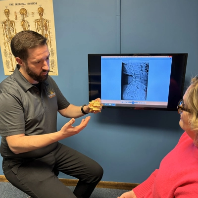 Examination room with on-site X-ray at Kentwood Family Chiropractic