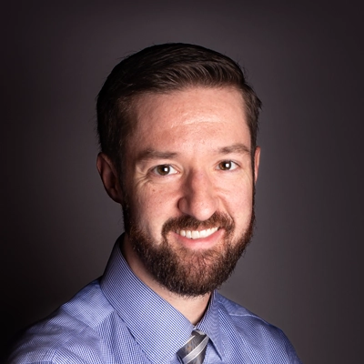 A headshot photo of Dr. Paul McAllister, a chiropractor at Kentwood Family Chiropractic.